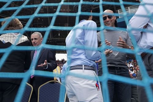 Major League Baseball Commissioner Rob Manfred (L) and former player Derek Jeter (R) visit with friends before an exhibition baseball game between the Cuban national baseball team and the Major League Baseball team Tampa Bay Devil Rays at the Estado Latinoamericano March 22, 2016 in Havana, Cuba. Cuban President Raul Castro and U.S. President Barack Obama attended the game, the first time a sittng president has visited Cuba in 88 years.