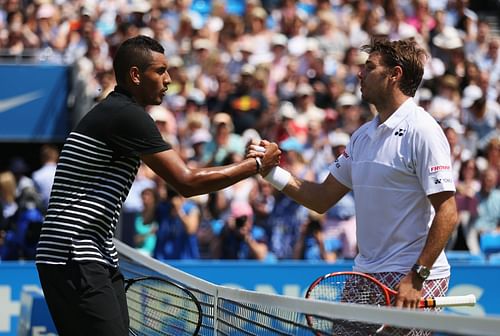 Nick Kyrgios and Stan Wawrinka during the 2015 Aegon Championships