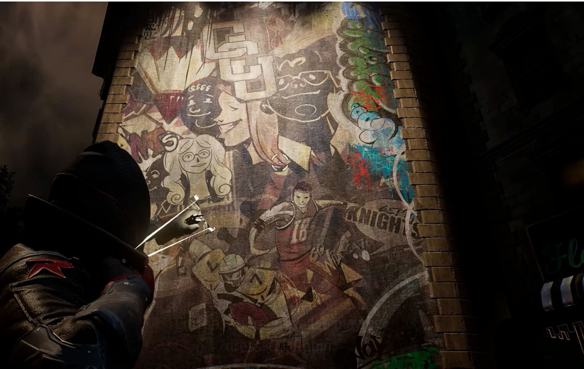This wall graffiti in Gotham Knights celebrates Gotham City University (Image via Batman Arkham Videos/YouTube)