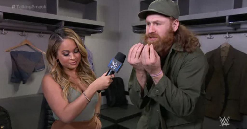 WWE interviewer Kayla Braxton with Sami Zayn