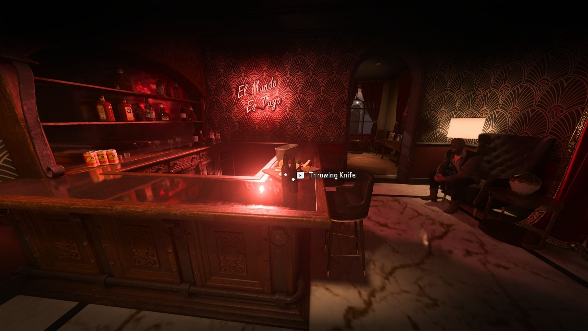 Bottles and a throwing knife in the bar (image via Activision)