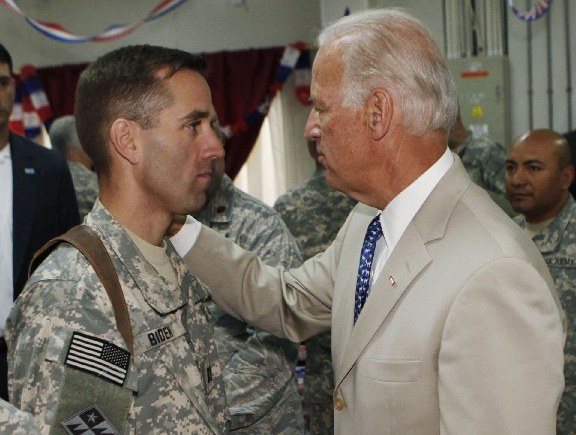 Beau Biden and his father after his return from Iraq (image via AP/Khalid Mohammed)