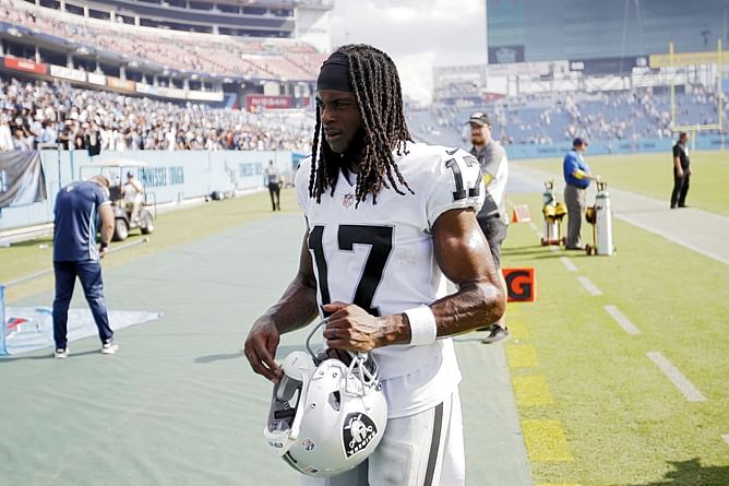 Davante Adams suspension decision expected on Wednesday with Raiders star possibly facing legal trouble for shoving cameraman - Reports