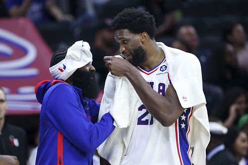 James Harden and Joel Embiid react to a play