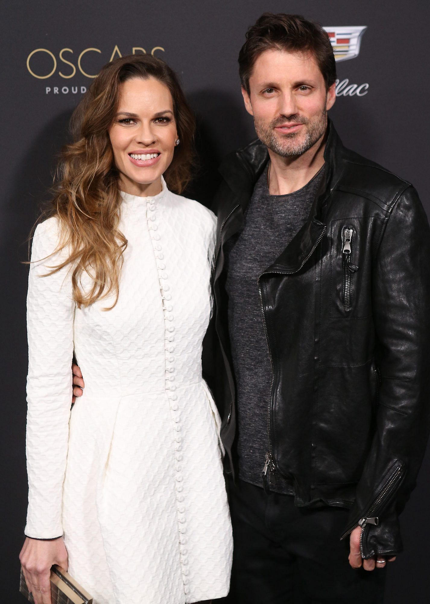 Hilary Swank and Philip Schneider (image via Getty Images)