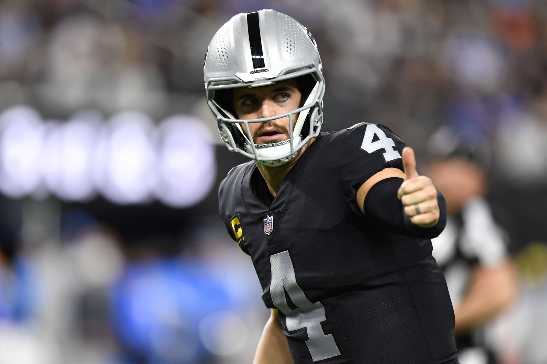 East Rutherford, New Jersey, USA. 6th Dec, 2020. Las Vegas Raiders  quarterback Derek Carr (4) reaches with tight end Foster Moreau (87) during  the NFL game between the Las Vegas Raiders and