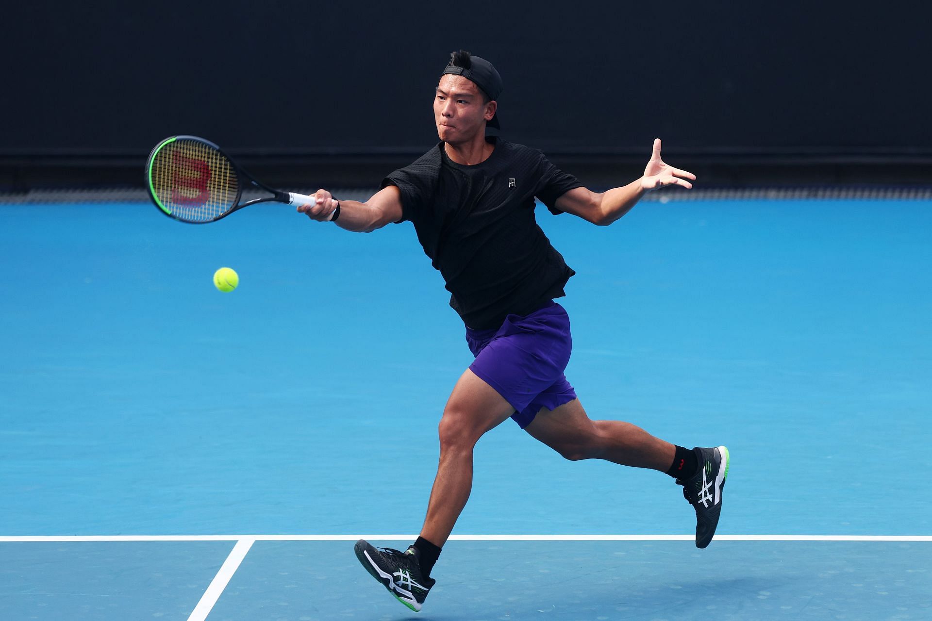 Li Tu pictured in the qualifying stages of the 2022 Australian Open.