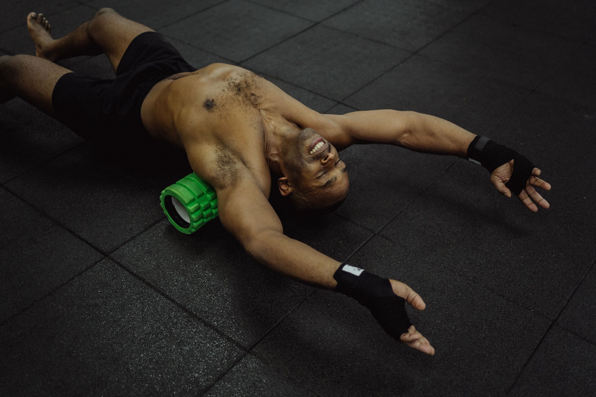 Foam rolling employs friction to relieve tension and realign the fascia, much like a massage. (Image via Pexels/ Ketut Subiyanto)