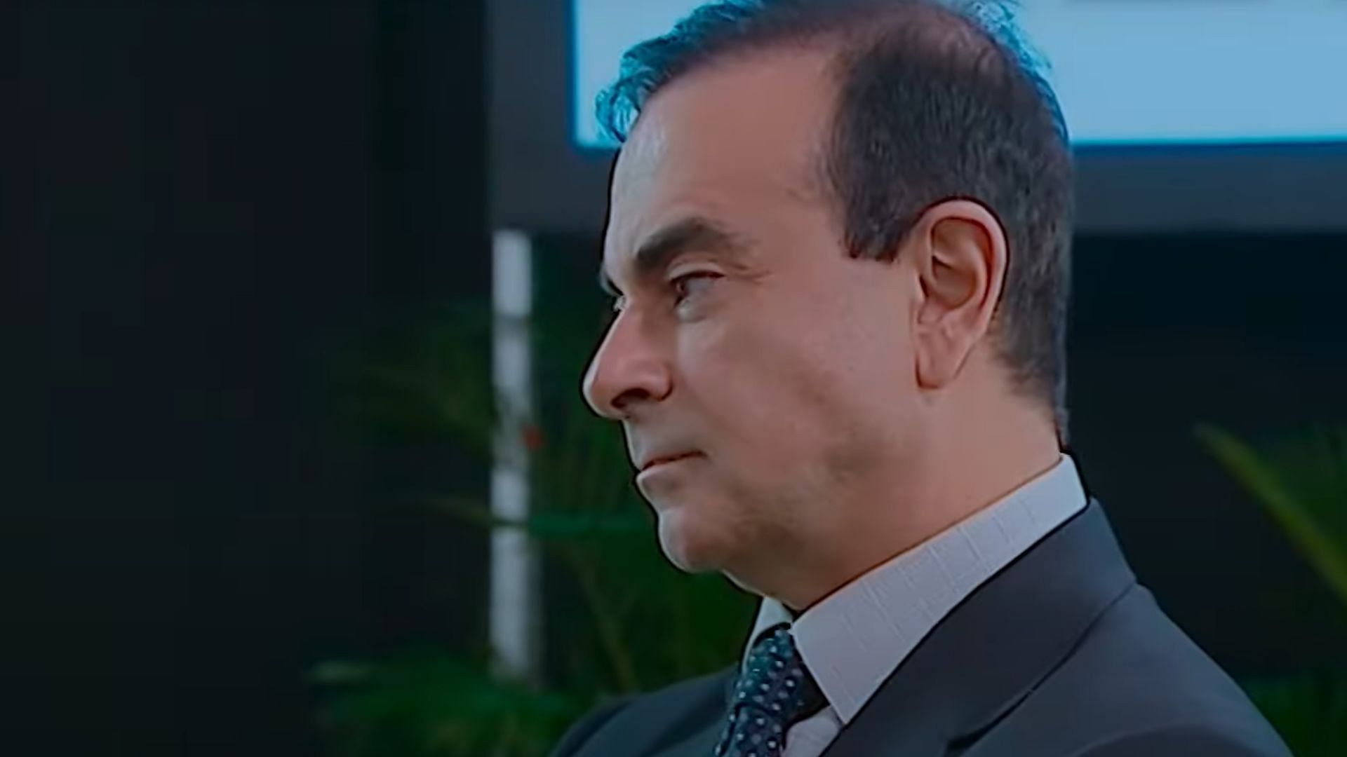 A still of Ghosn (Image Via Netflix France)