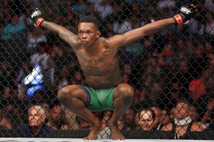 UFC 293: “Chinese from the waist down” - Israel Adesanya rocks red shorts  for UFC 293 media day photoshoot, triggers 'Chinese' hysteria among MMA fans