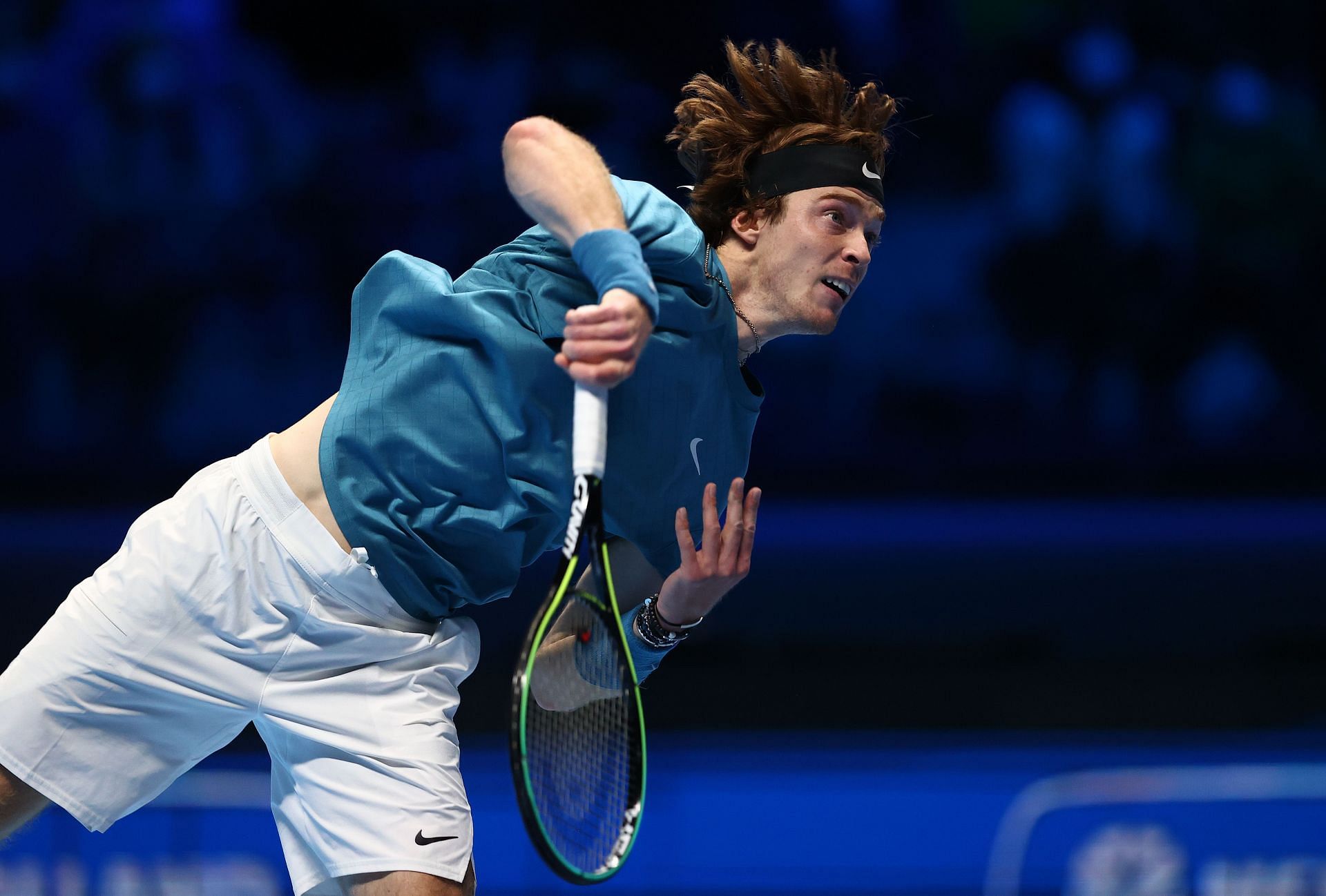 Andrey Rublev serves against Casper Ruud in the 2021 ATP Finals.