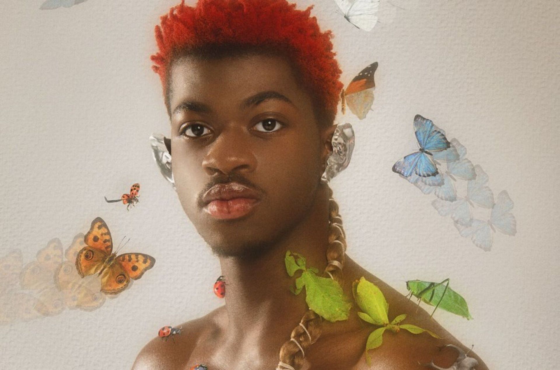 Lil Nas X with his trademark Butterfly animations (Image via Lil Nas X)