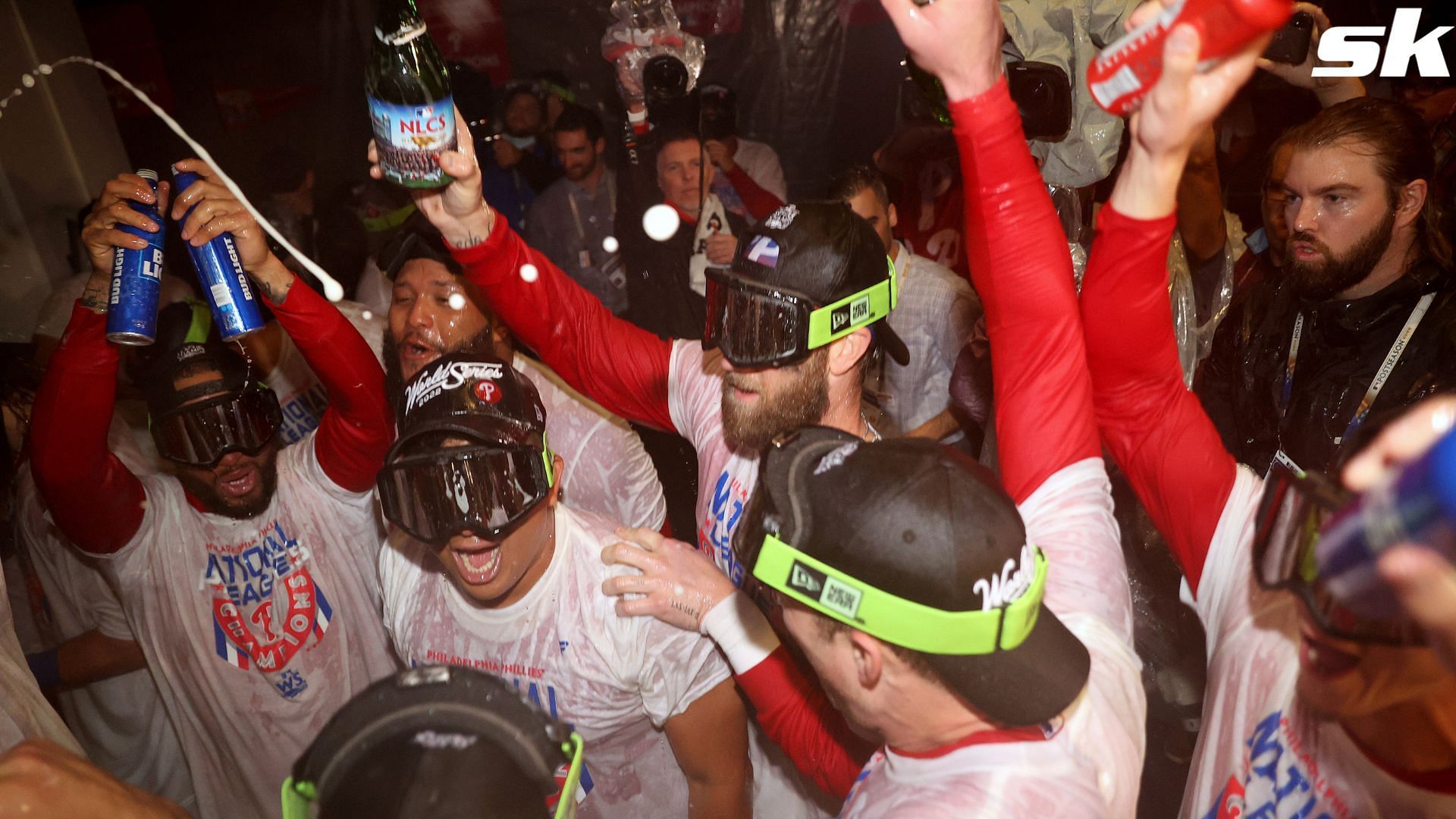 A Philadelphia Phillies fan chugged beers while hanging from a light pole to celebrate club