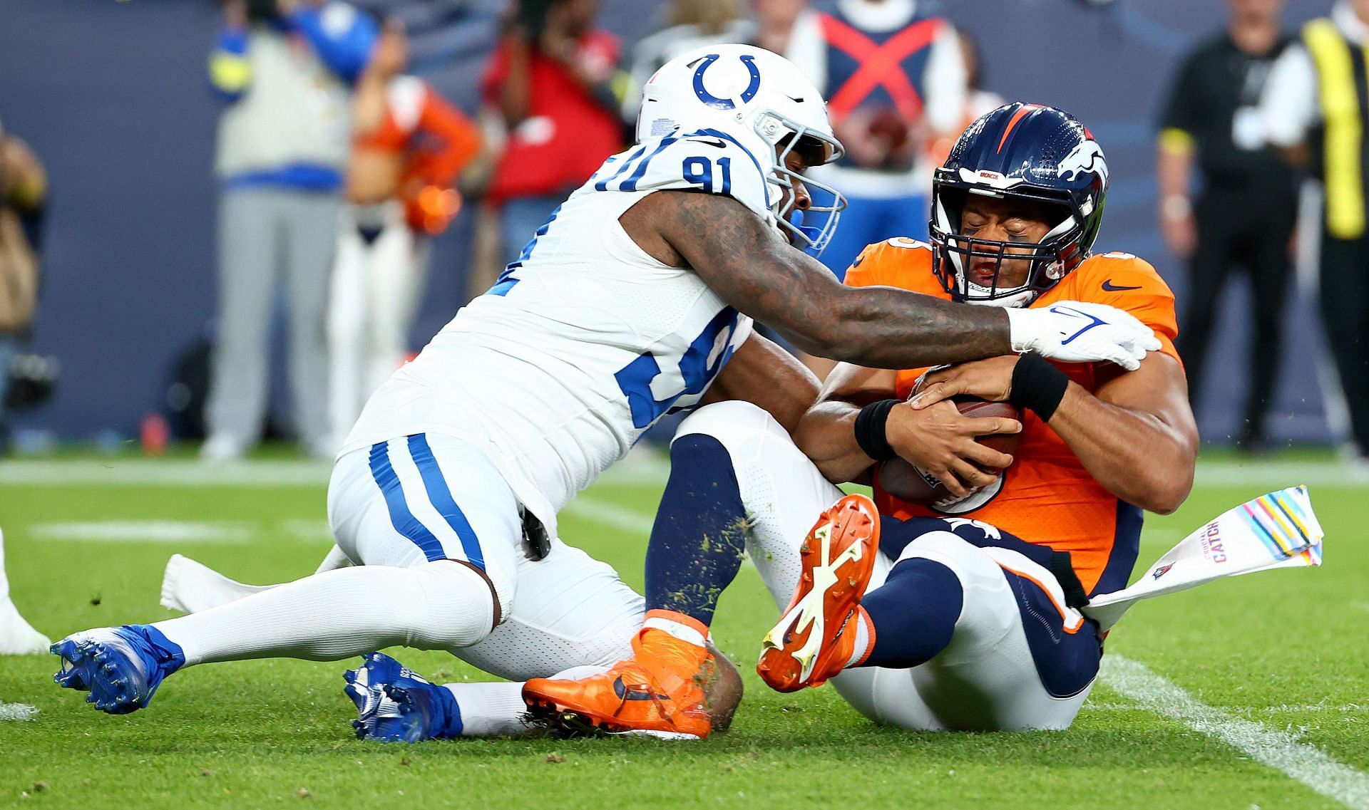 Russell Wilson's concussion the latest setback in awful year for the Denver  Broncos - CBS Colorado