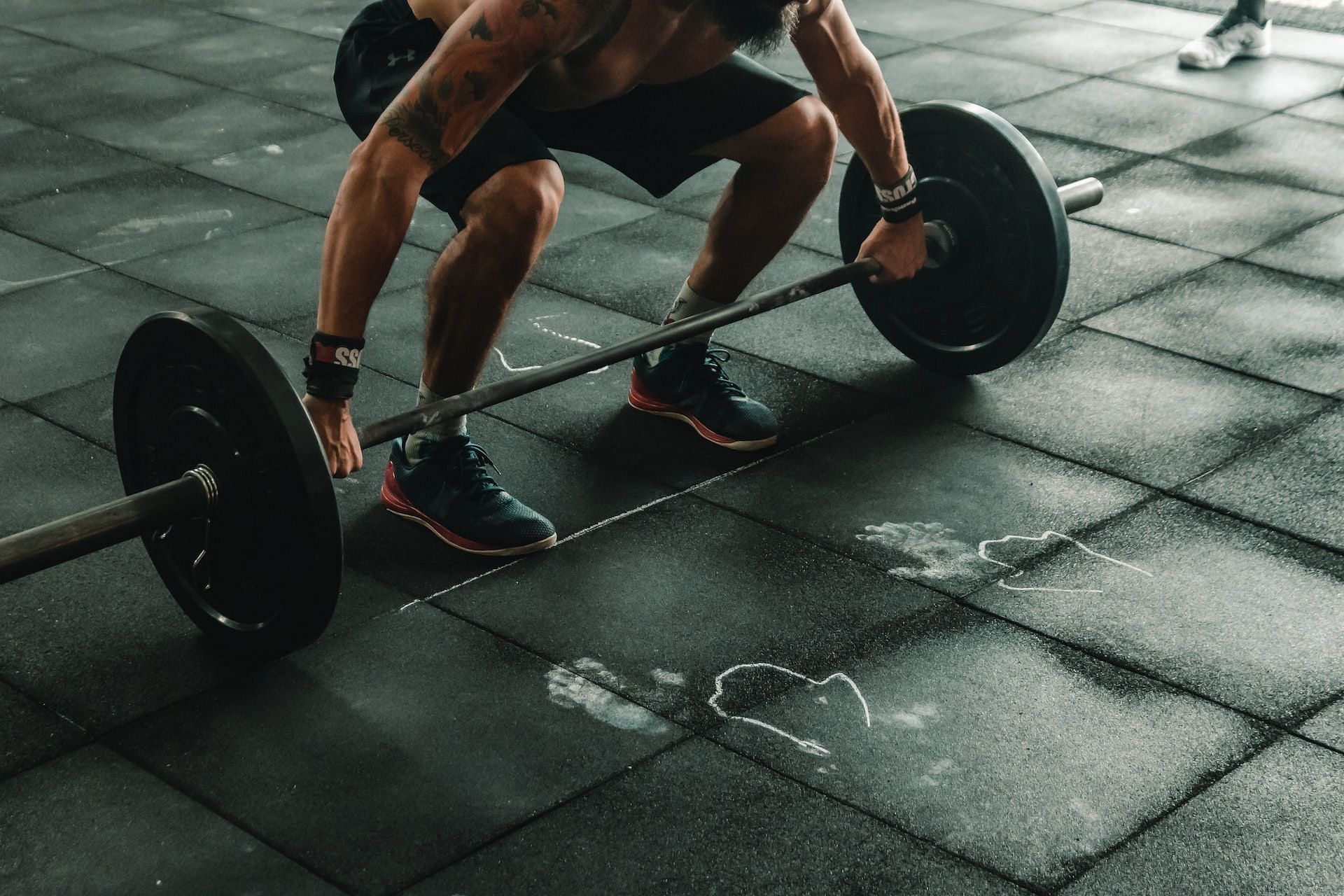Certain exercises particularly target the front deltoid muscles. (Photo via Pexels/Victor Freitas)