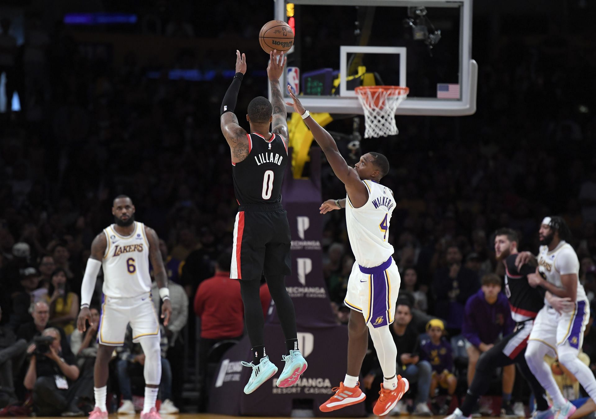 Portland Trail Blazers superstar guard Damian Lillard scoring a clutch three-pointer in the final seconds of the game against versus the LA Lakers