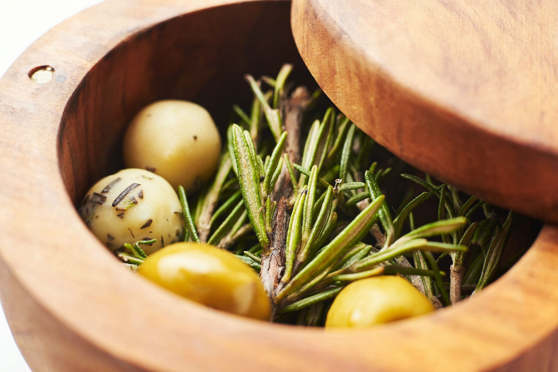 Green olives are often used along with herbs in Mediterranean cooking (Image via Unsplash/Daniel Agudelo)