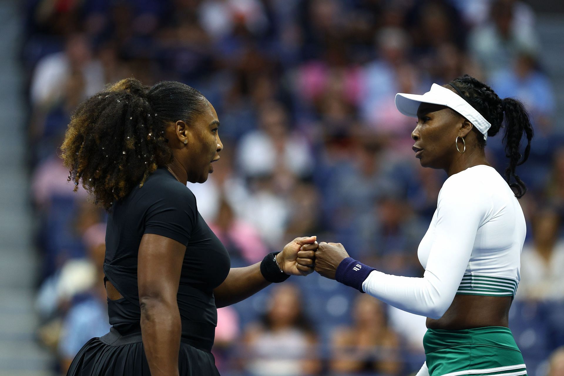 Serena Williams and Venus Williams pictured at the 2022 US Open.