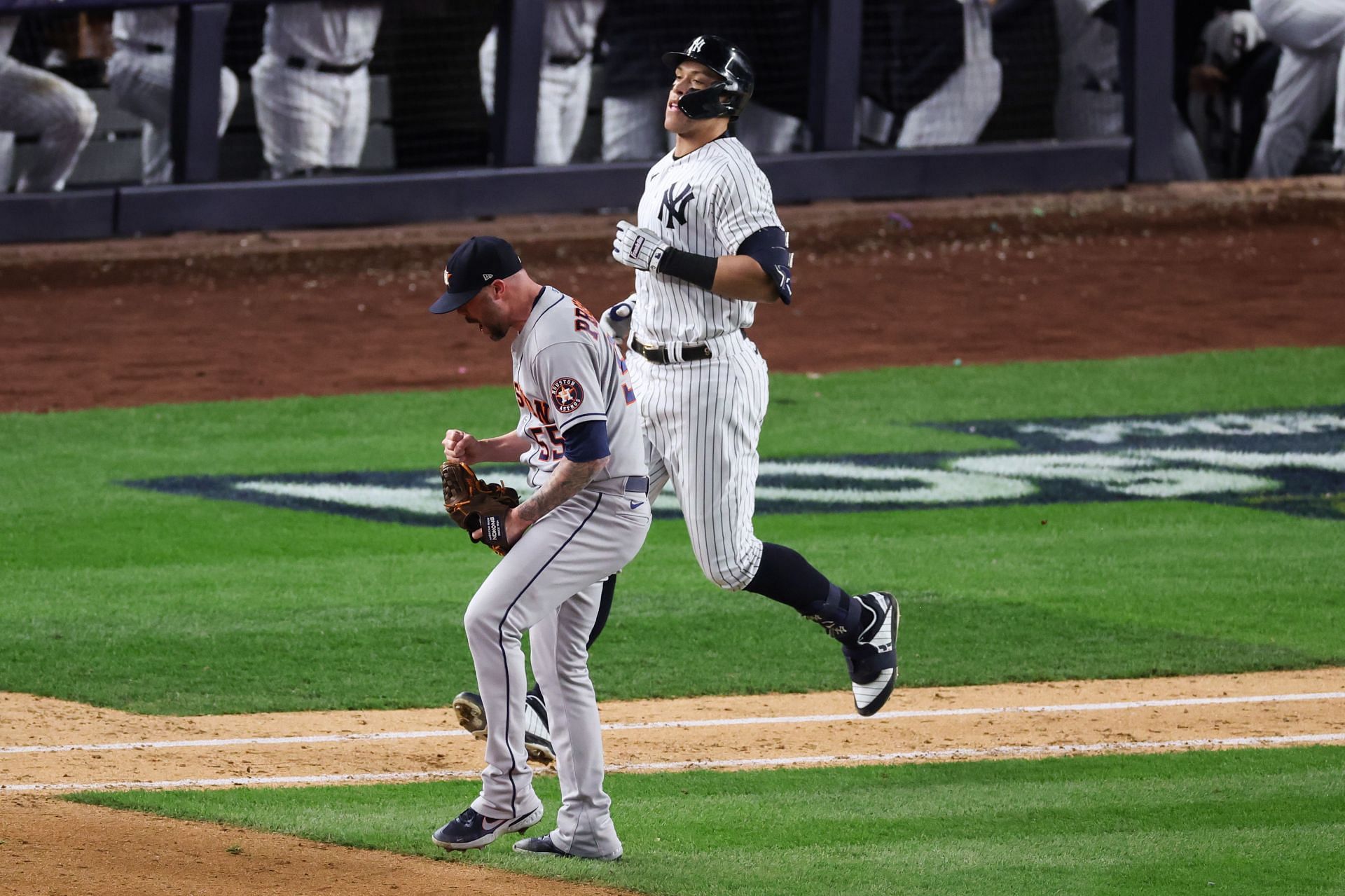 Aaron Judge runs to first base after grounding out in Game 4 of the ALCS.
