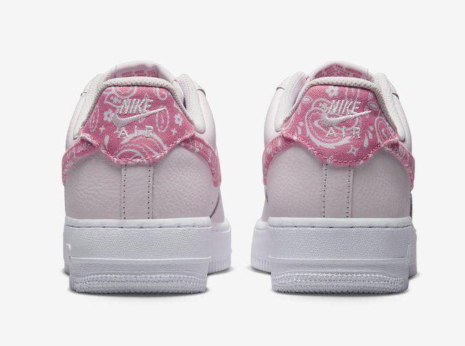 1 reimagined collection- Millennial pink Air Force ones with matching  ribbon laces. Not seen: …