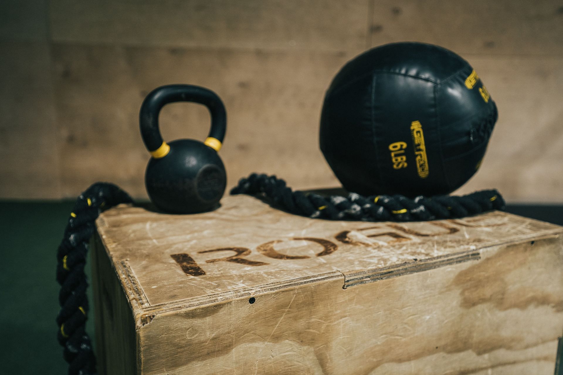 Using a medicine ball while exercising is a good technique to increase your speed and power. (Image via Unsplash/ Ryan De Hamer)