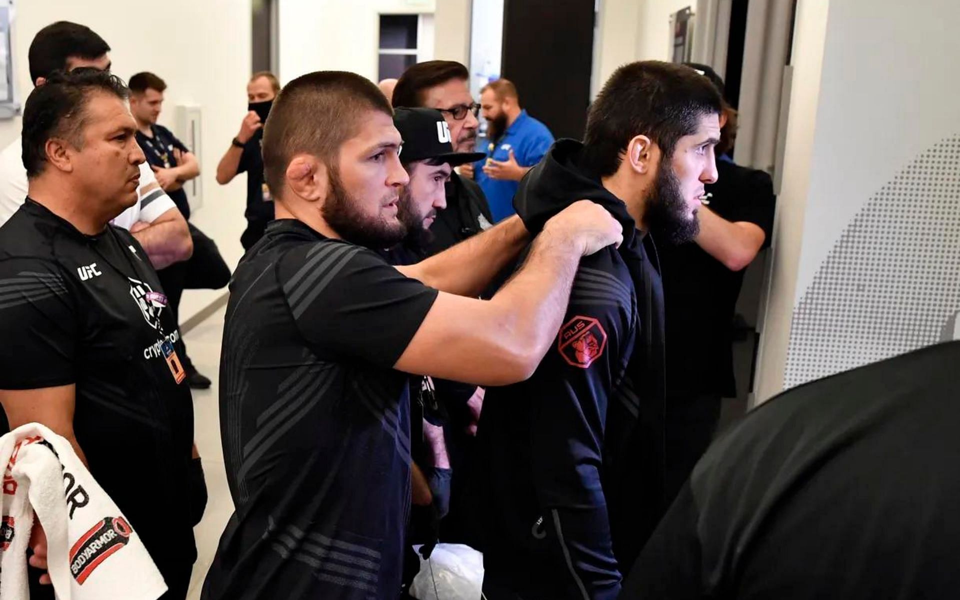 Islam Makhachev and Khabib Nurmagomedov [image courtesy of Mike Roach/Zuffa LLC]