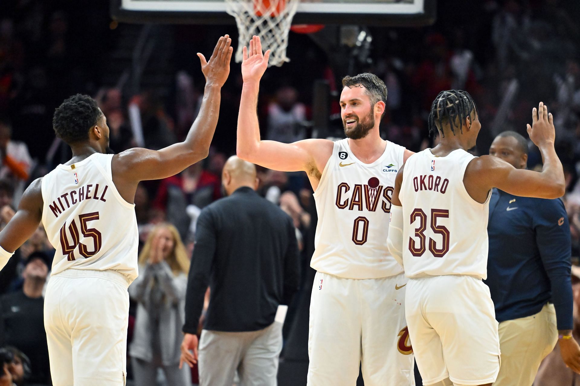 Cleveland Cavaliers All-Star guard Donovan Mitchell (left) high-fiving teammate Kevin Love (centre)