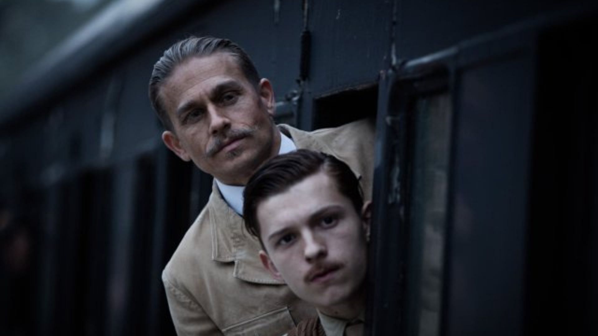 Charlie Hunnam and Tom Holland in the Lost City of Z (Image via IMDB)