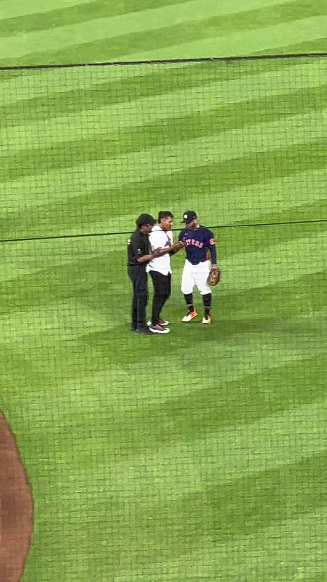 Watch: Crazed Fan Runs Onto Field, Hugs Houston Astros' Jose Altuve