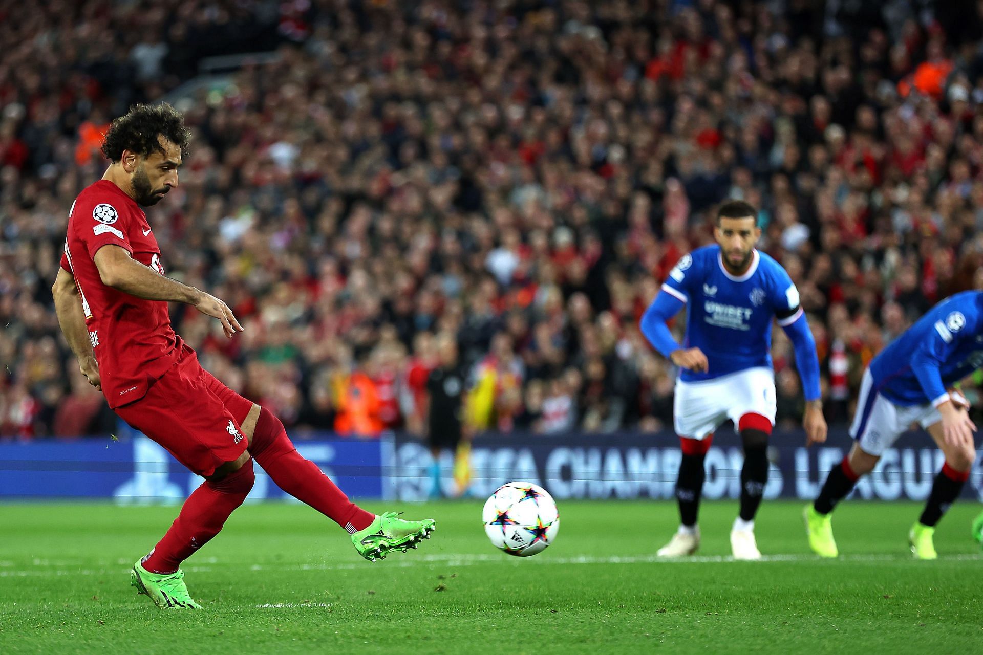 Mohamed Salah converts the spot-kick against Rangers