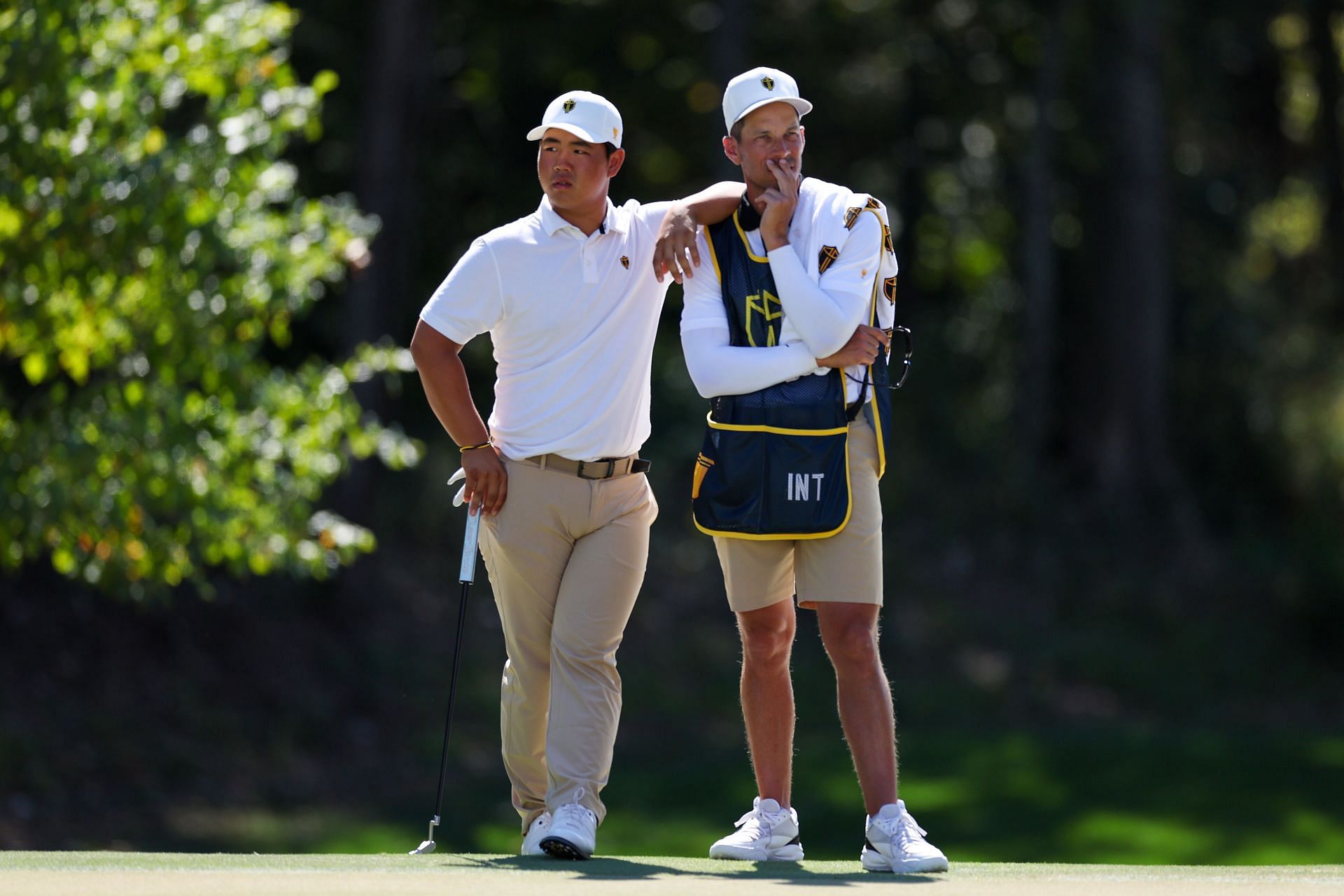 Tom Kim and Joe Skovron at the 2022 Presidents Cup - Day Three (Image via Getty Images/Rob Carr)