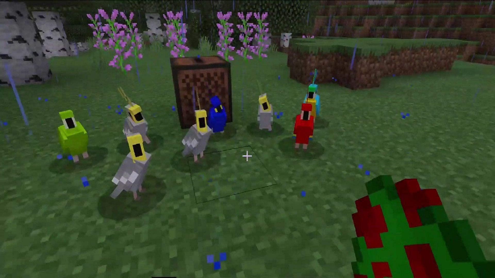 A group of parrots dancing to a jukebox in Minecraft (Image via Mojang)