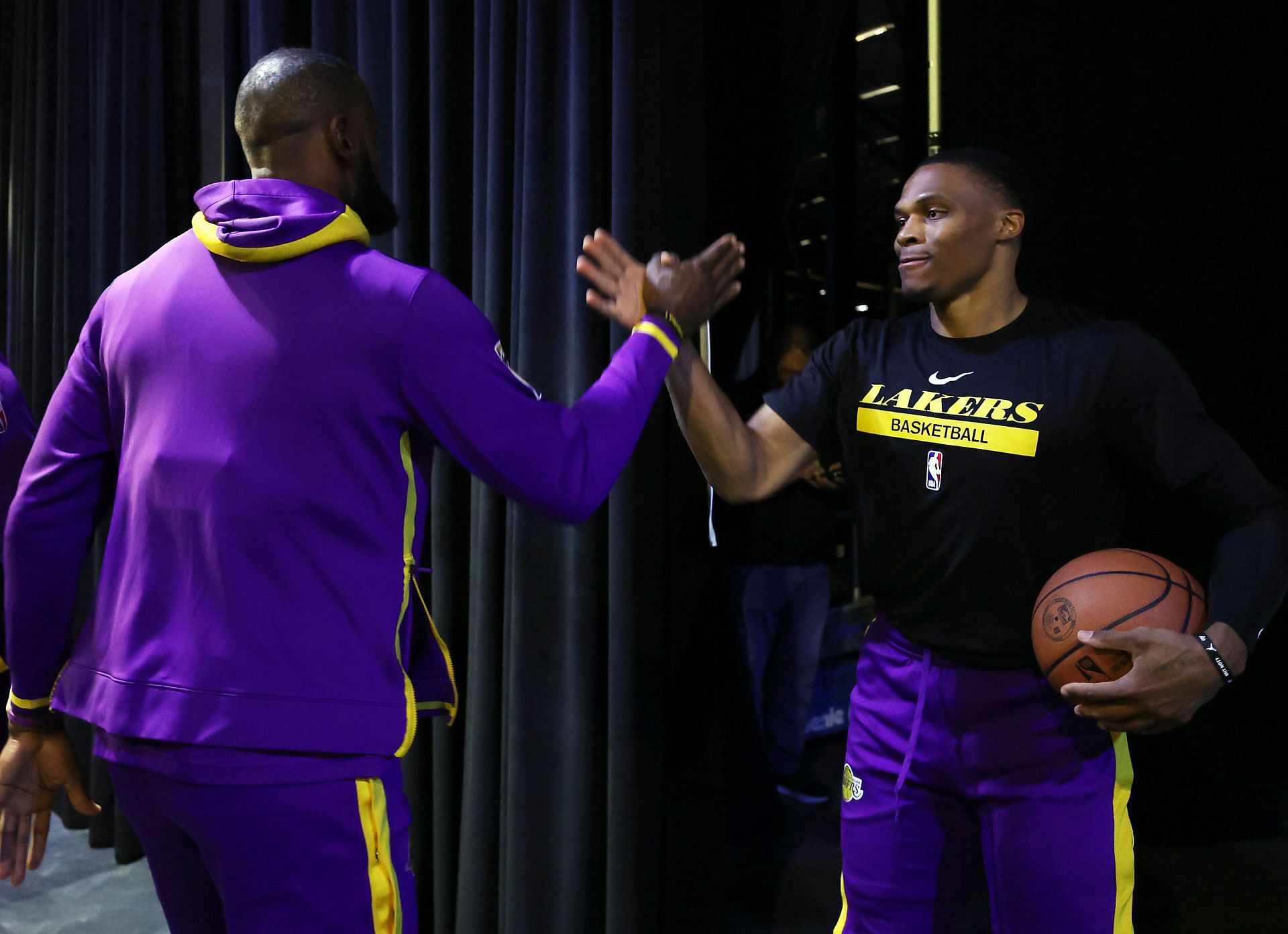 Russell Westbrook, right, of the LA Lakers greets LeBron James