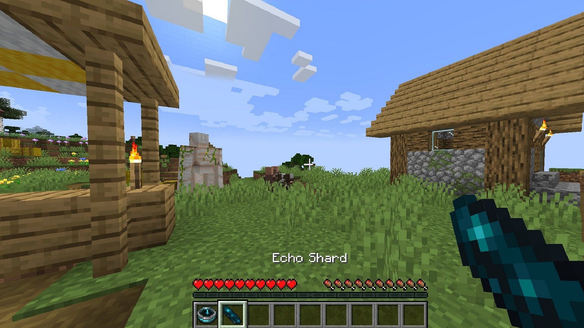 A player holding an Echo Shard in Minecraft (Image via Mojang)