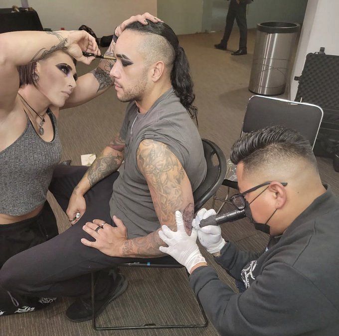WWE star seen twinning with Rhea Ripley puts on makeup and tattoos   Flipboard