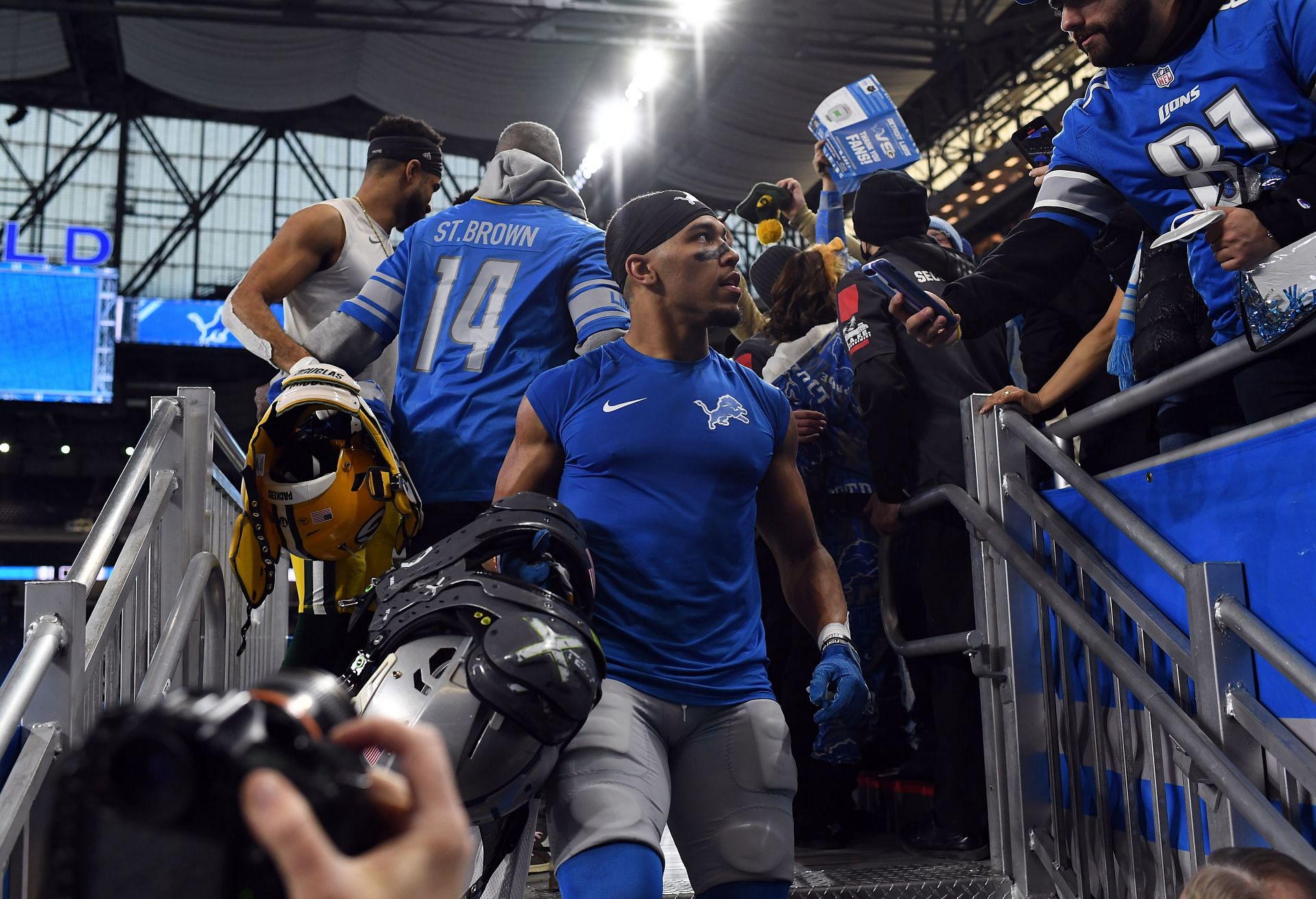 A Packers fan poured beer on Detroit Lions WR Amon-Ra St. Brown