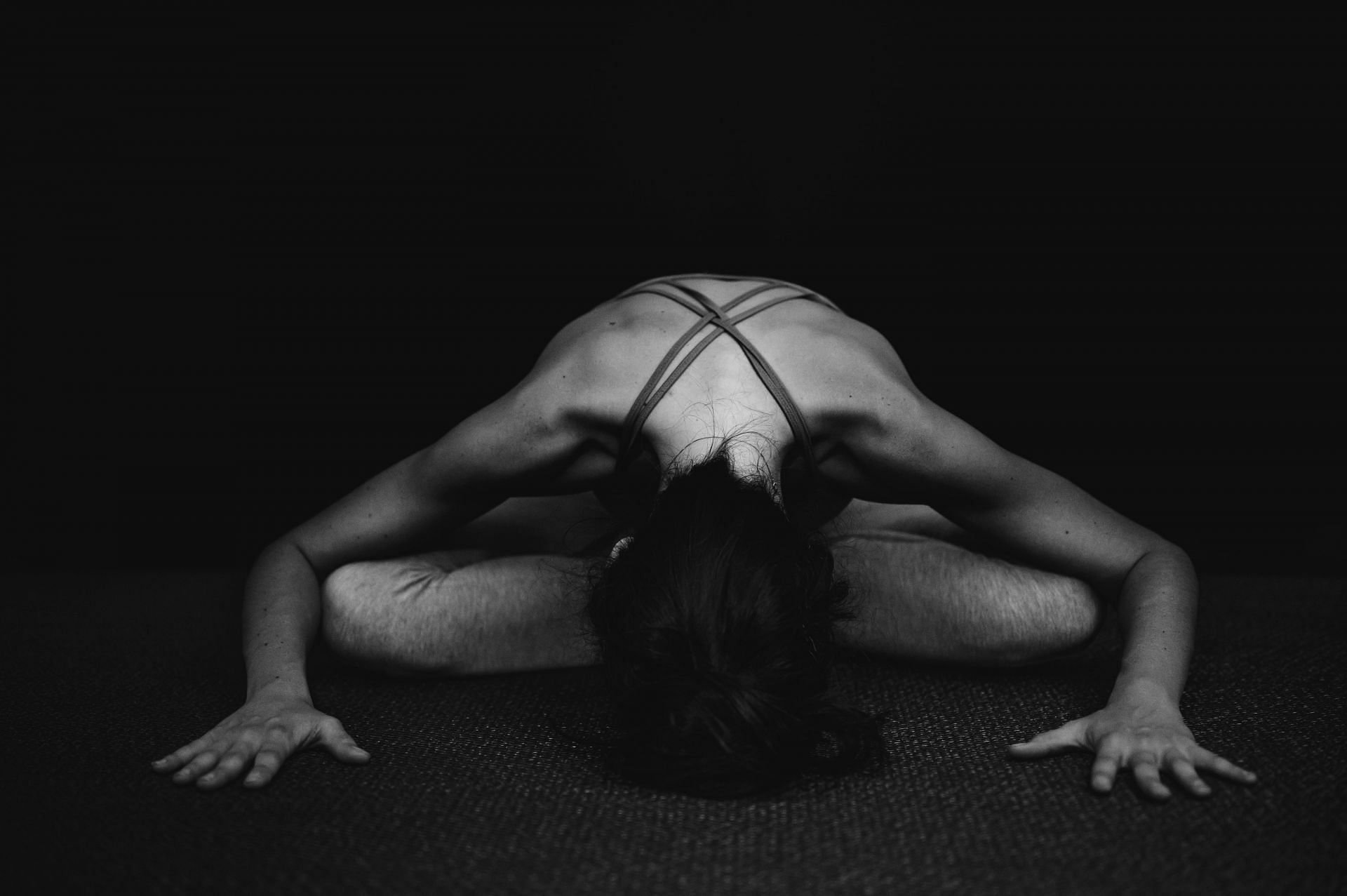 Yin Yoga concentrates on the fascia, connective tissues, and joints. (Image via Unsplash/ Conscious Design)