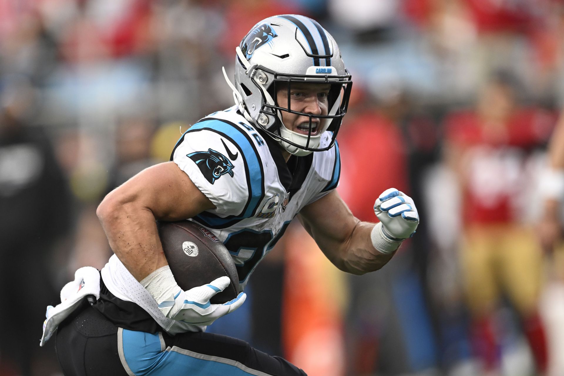 Carolina Panthers running back Christian McCaffrey (22) stands on the  sidelines as Carolina plays the Los Angeles Rams in the second half of an  NFL football game in Charlotte, North Carolina on