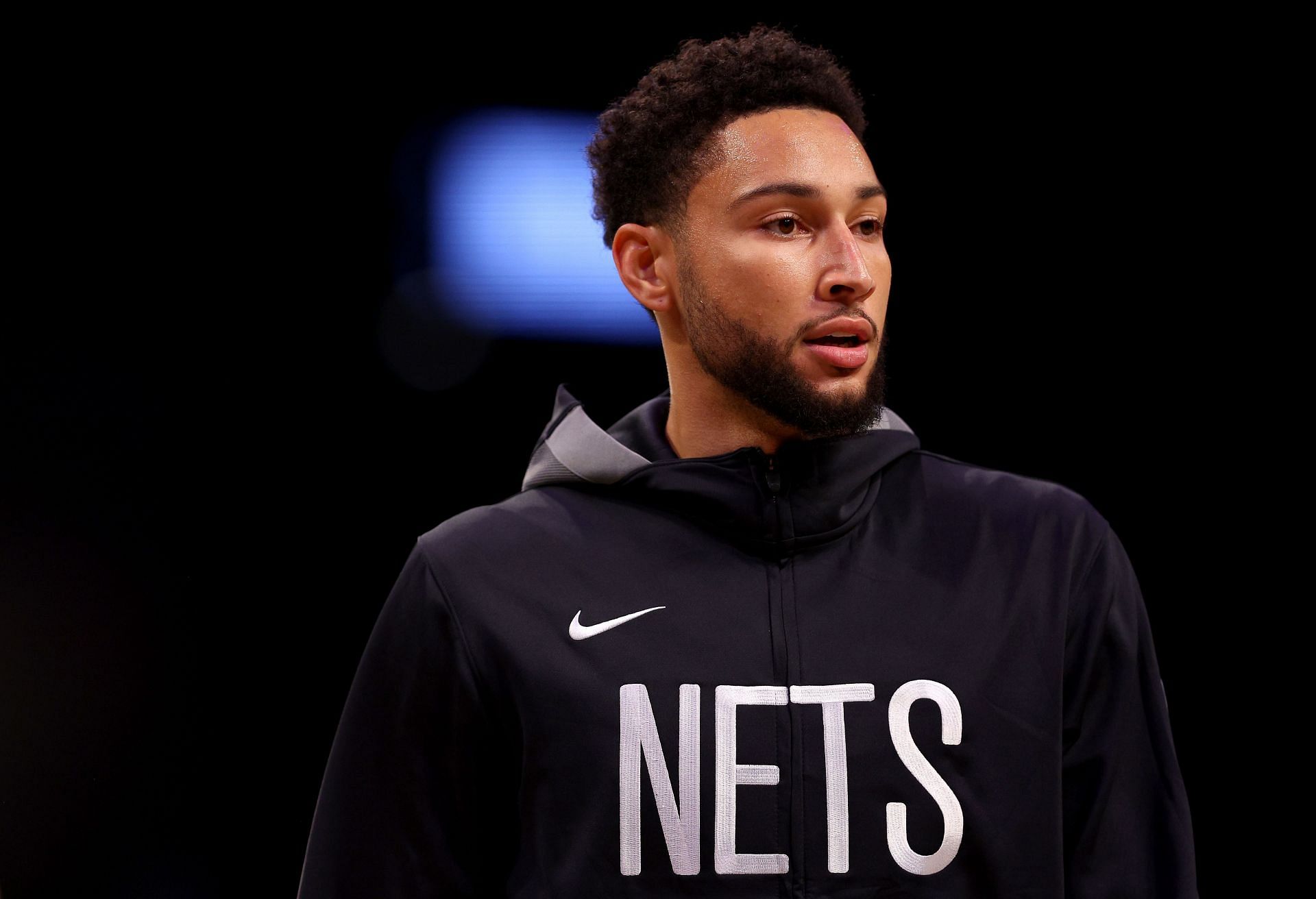 Ben Simmons warms up before a game