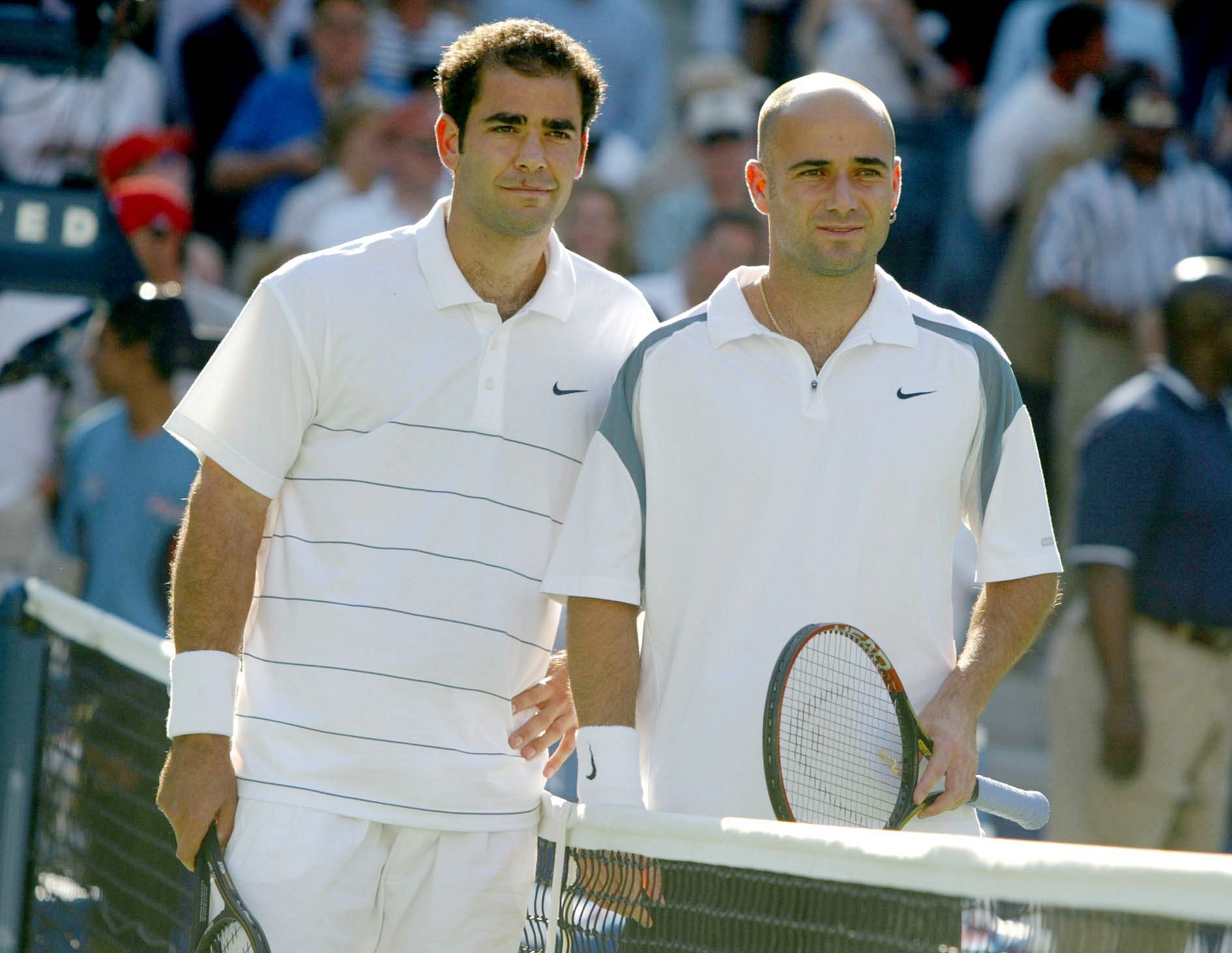 Pete Sampras (L) and Andre Agassi