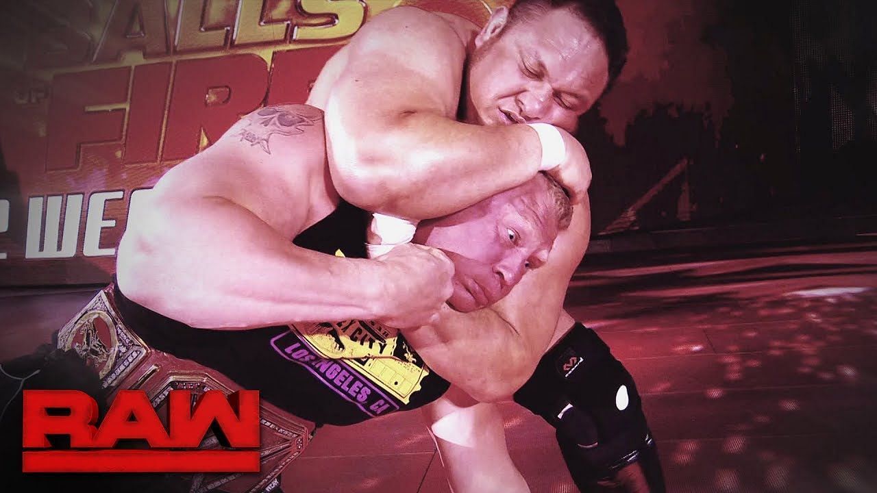 Samoa Joe trying to choke Lesnar