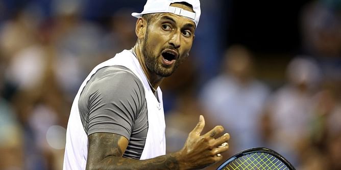 Nick Kyrgios reacts to his incredible shot around the net at Tokyo Open