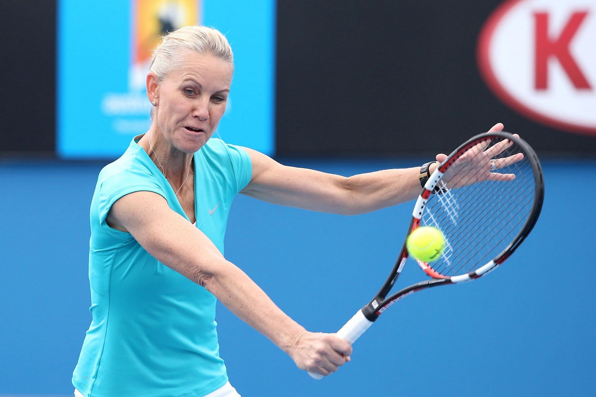 Rennae Stubbs plays a backhand during the legends doubles match in the 2015 Australian Open.