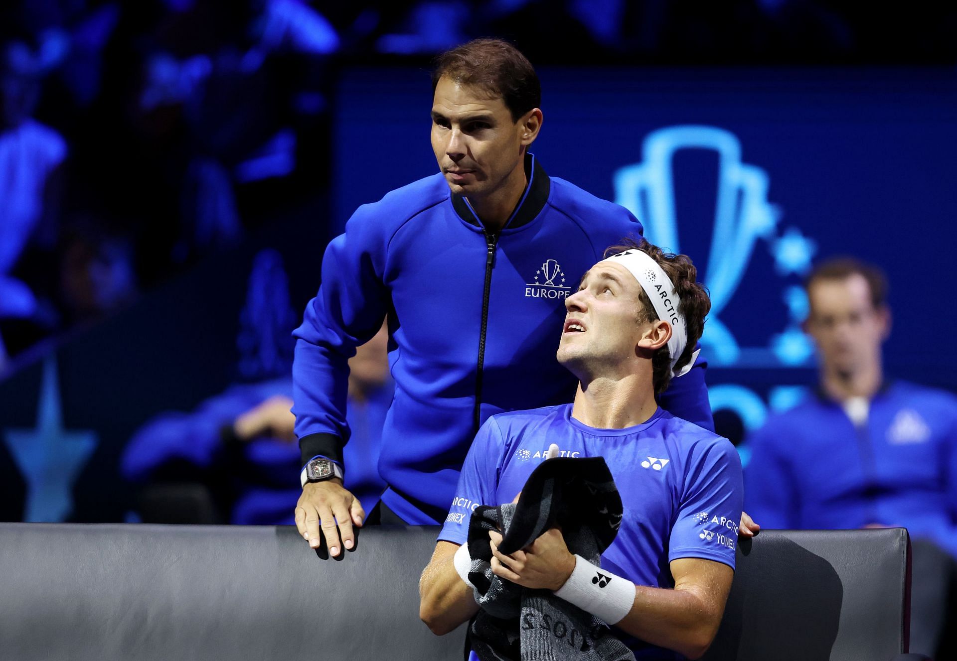 Rafael Nadal (left) speaks to teammate Casper Ruud (right) from the sidelines during the latter&#039;s match for Europe in the Laver Cup.