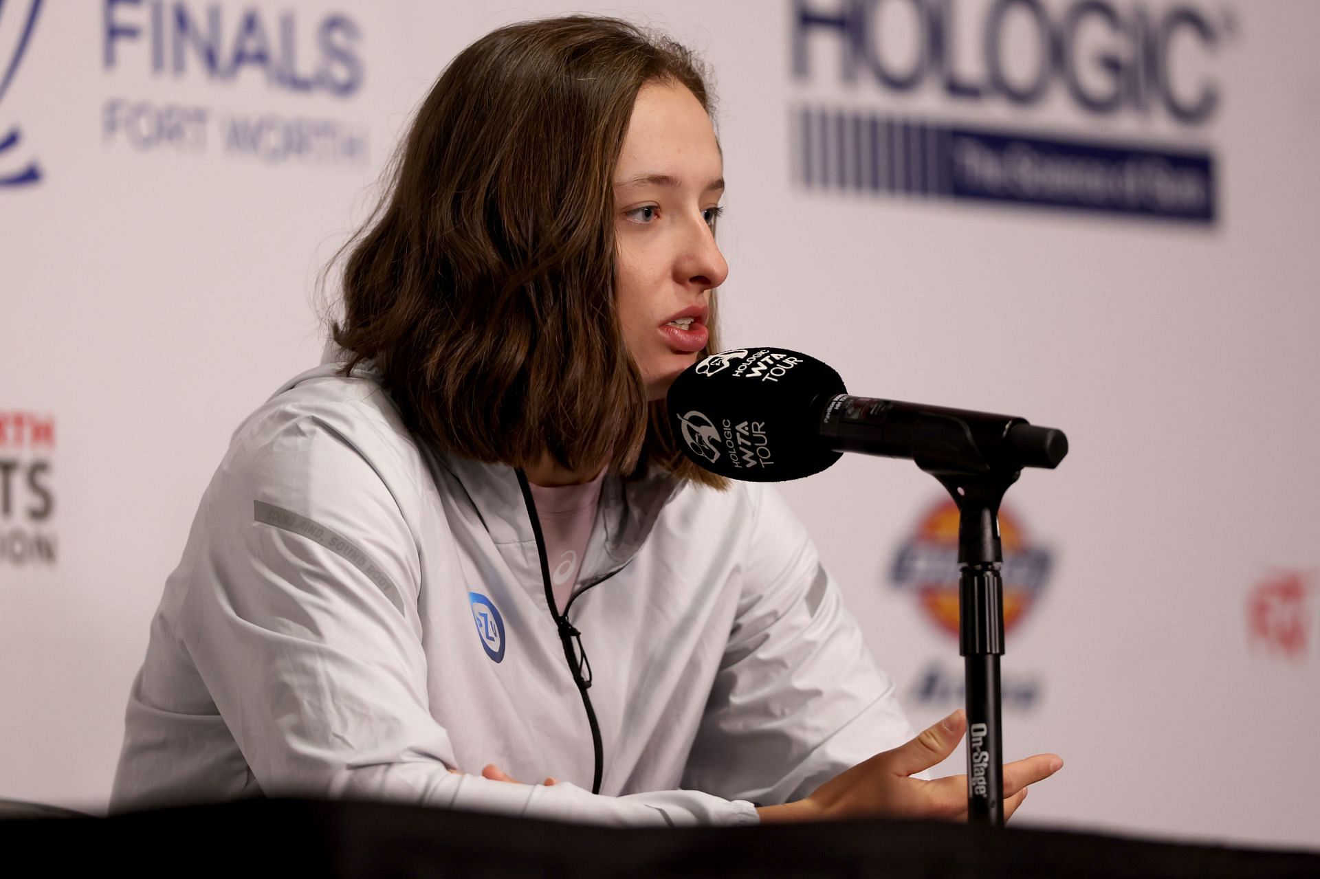 Iga Swiatek fields questions from the media at a press conference ahead of the 2022 WTA Finals 