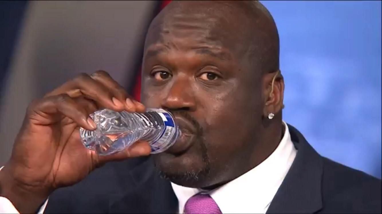 Shaquille O'Neal holding a water bottle [Source: Reddit- r/ShaqHoldingThings]
