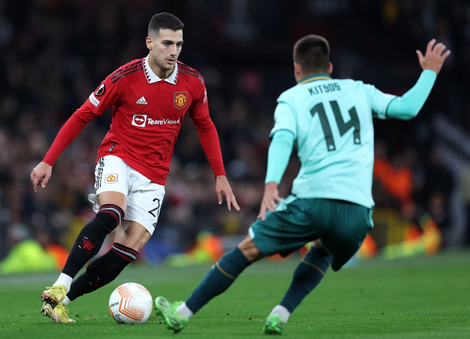 Diogo Dalot (left) wants to extend his stay at Old Trafford.