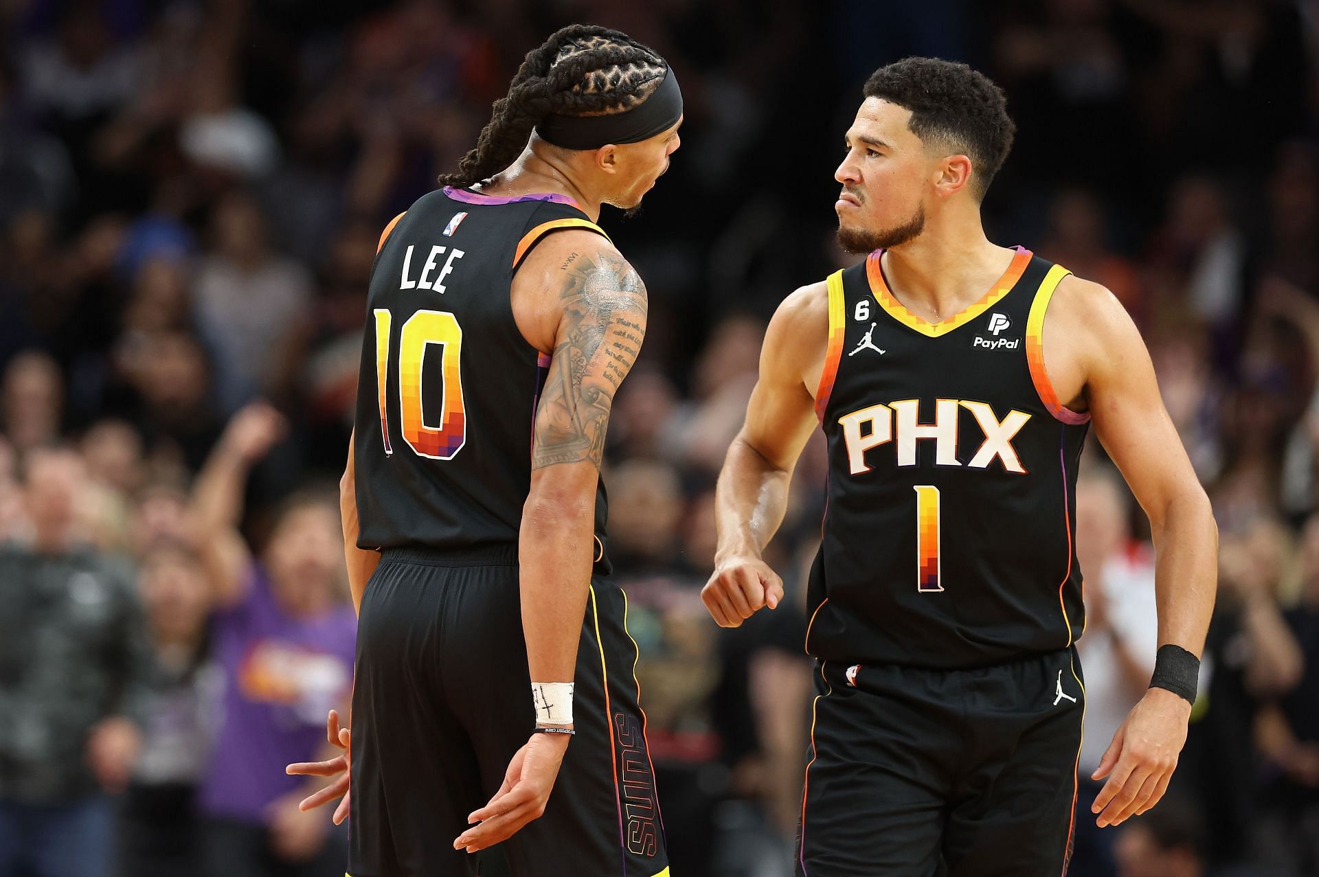 Phoenix Suns guards Damion Lee and Devin Booker
