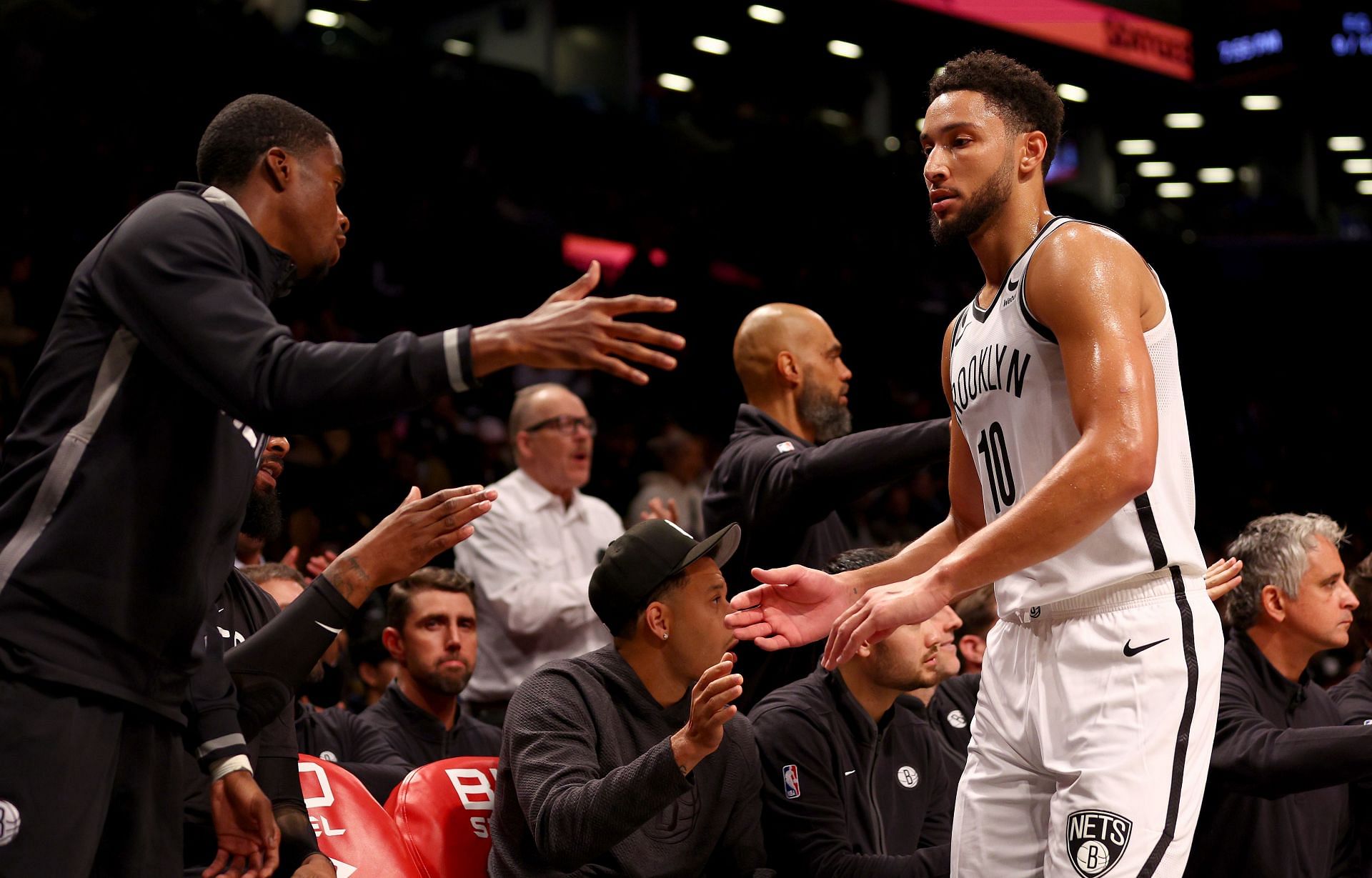 Ben Simmons of the Brooklyn Nets is congratulated by teammates