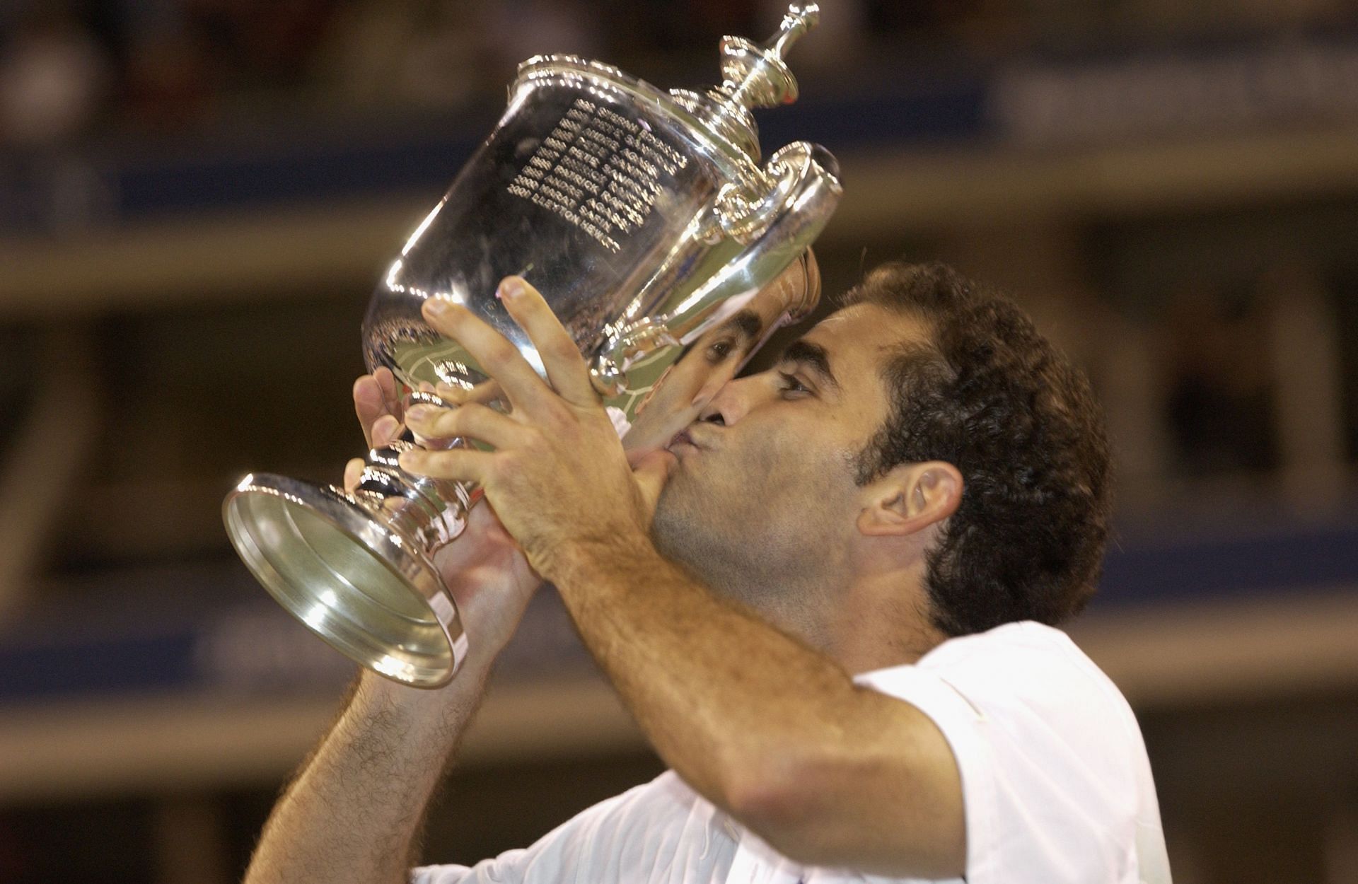 Pete Sampras with the US Open trophy in 2002